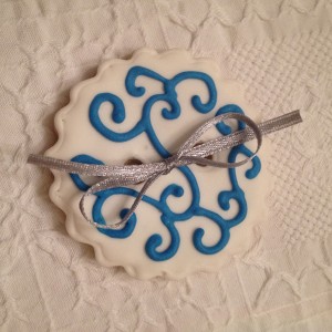 Round with design and ribbon       